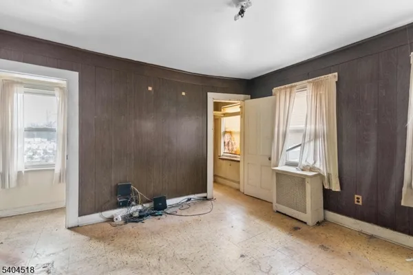 an empty room with windows