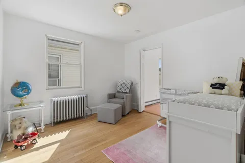 a bedroom with a bed and furniture