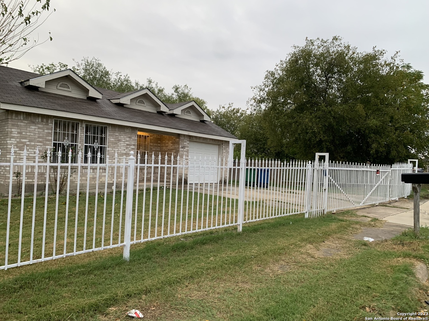 a view of a backyard with a garden