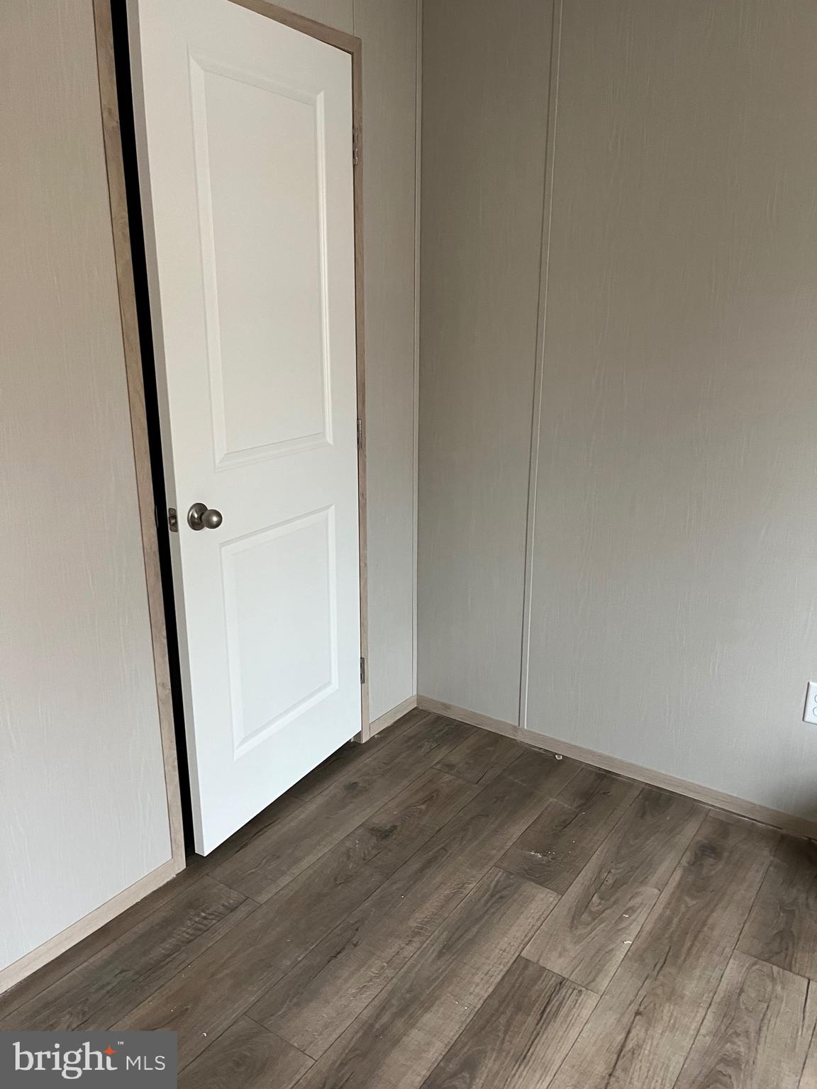 334 Opal Road Millville, NJ 08332 - Photo 11 of 15 an empty room with wooden floor