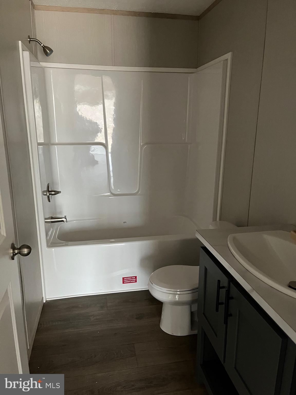 334 Opal Road Millville, NJ 08332 - Photo 12 of 15 a bathroom with a sink and a toilet