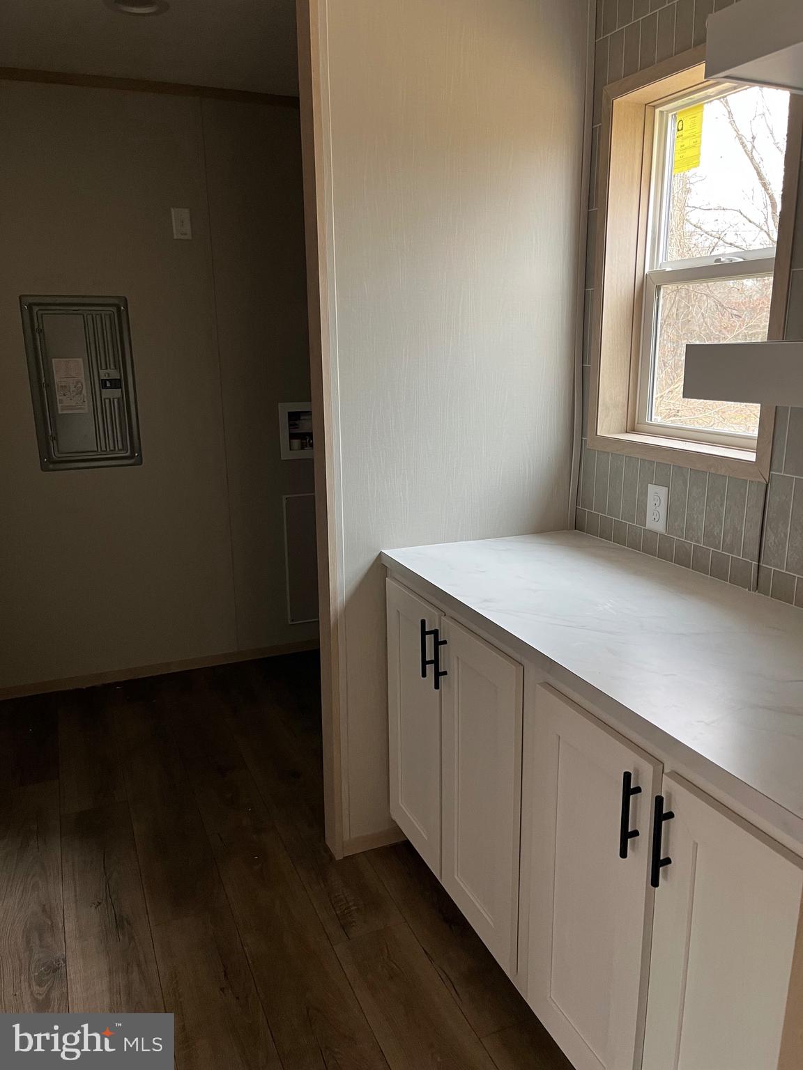 334 Opal Road Millville, NJ 08332 - Photo 13 of 15 a view of a hallway with wooden floor and cabinet