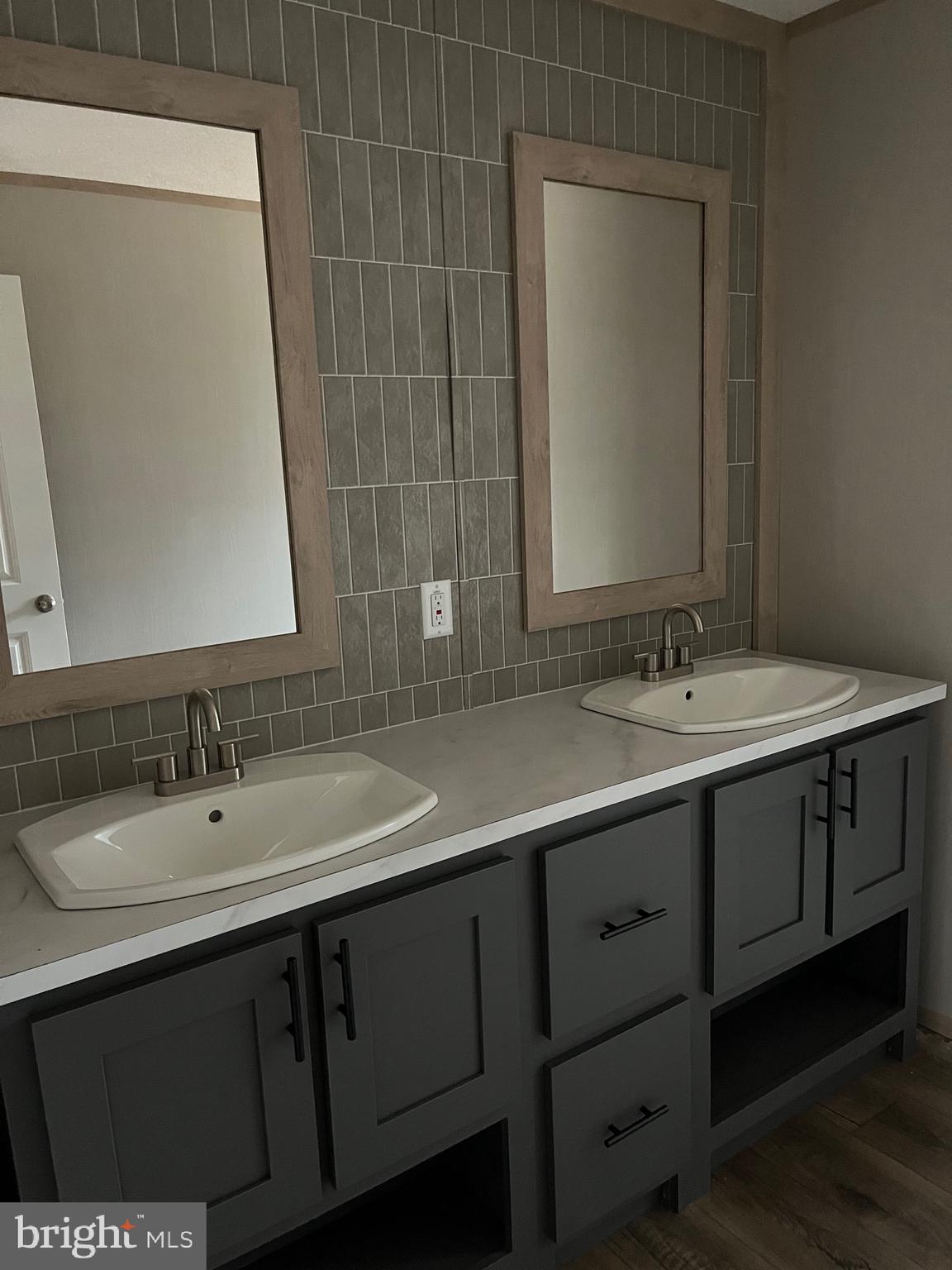 334 Opal Road Millville, NJ 08332 - Photo 3 of 15 a bathroom with a sink and a mirror