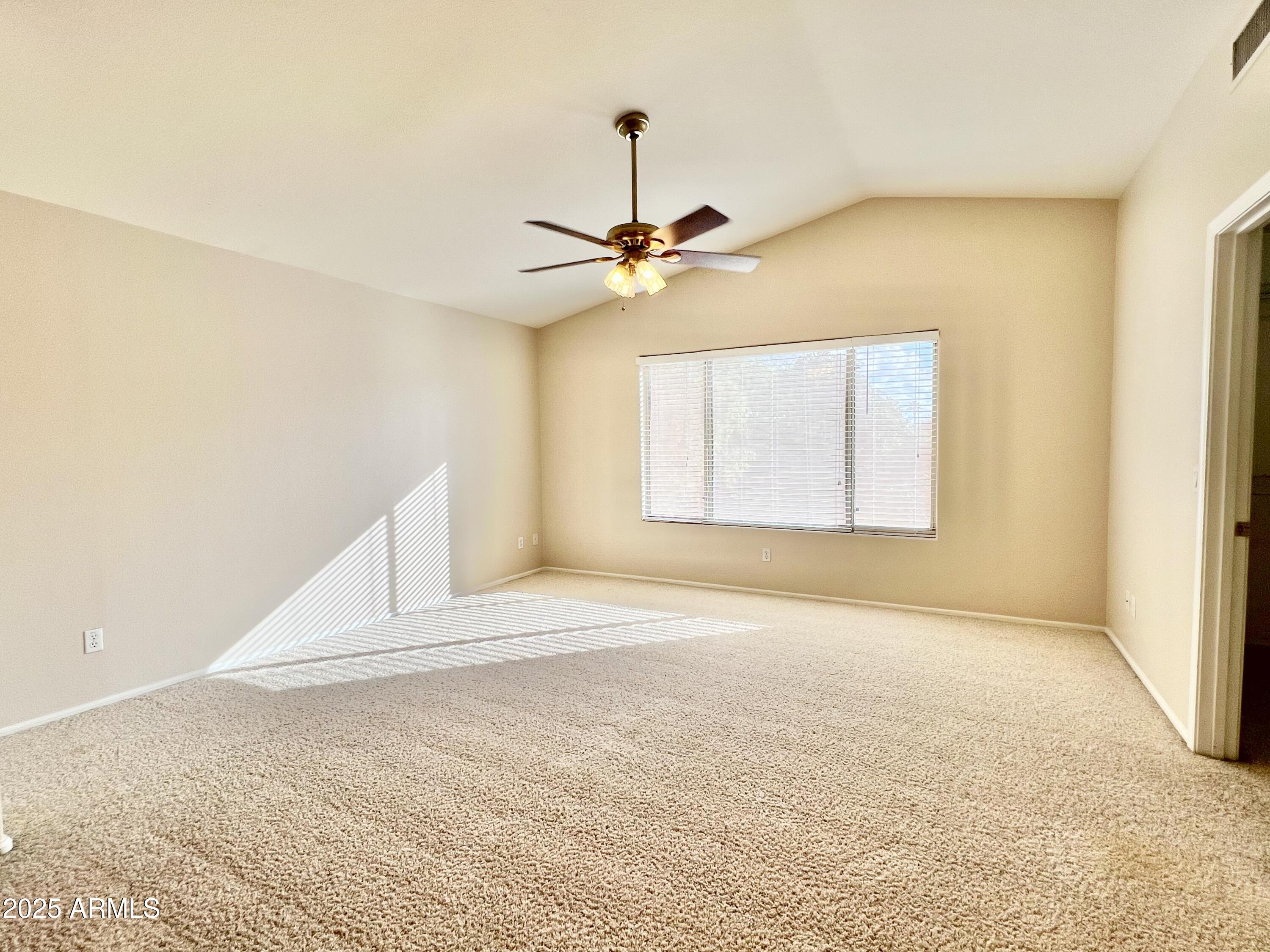 7309 West Mohawk Lane Glendale, AZ 85308 - Photo 18 of 24 a view of an empty room with a window