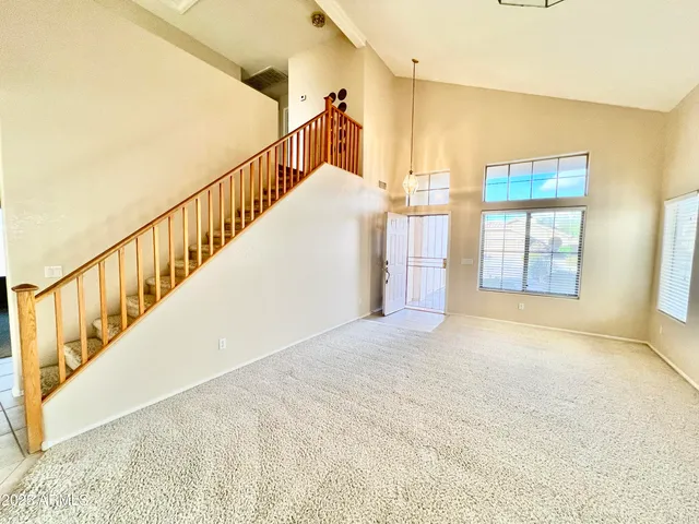 a view of an entryway with staircase
