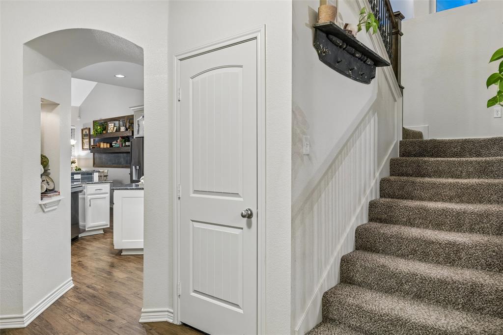 10176 Country View Lane Forney, TX 75126 - Photo 26 of 40 a view of entryway and kitchen