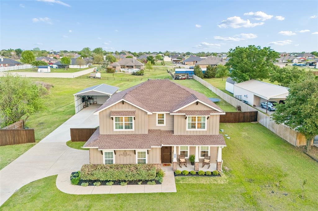 10176 Country View Lane Forney, TX 75126 - Photo 38 of 40 a front view of a house with garden