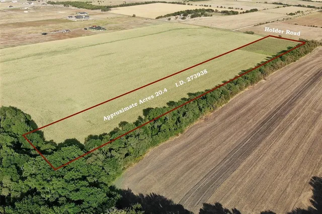 a view of a floor to ceiling window and an ocean view