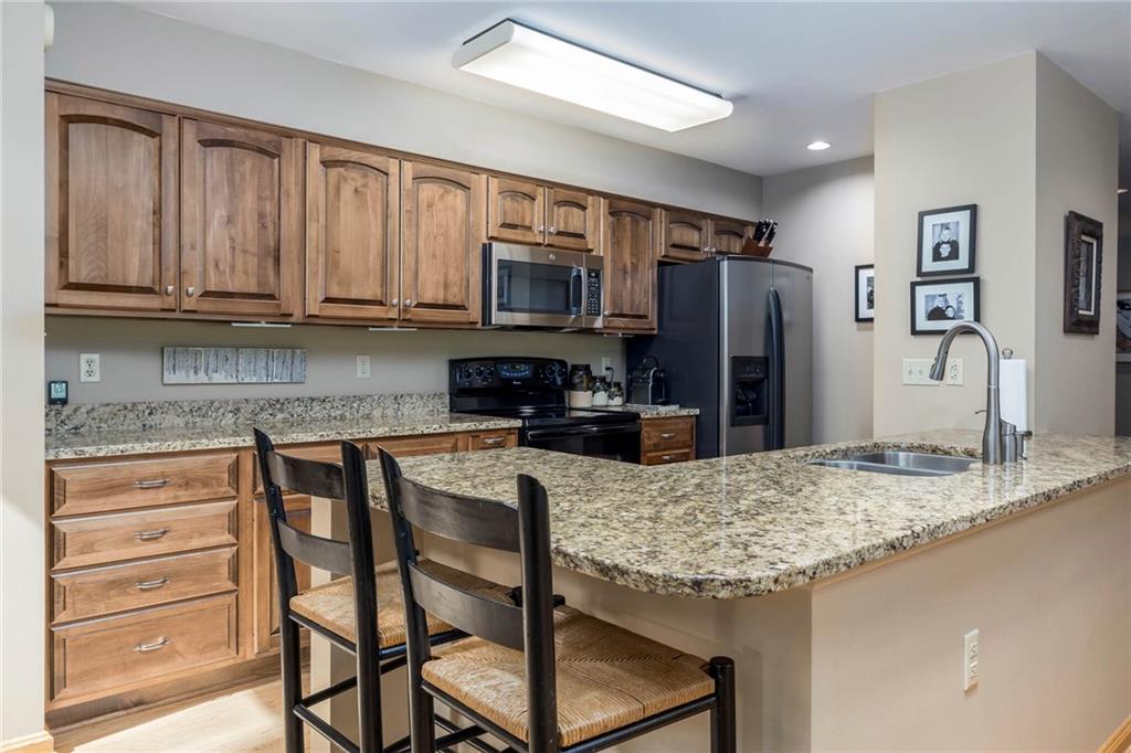 924 Old Washington Road Canonsburg, PA 15317 - Photo 16 of 46 a kitchen with granite countertop a refrigerator stove microwave and sink