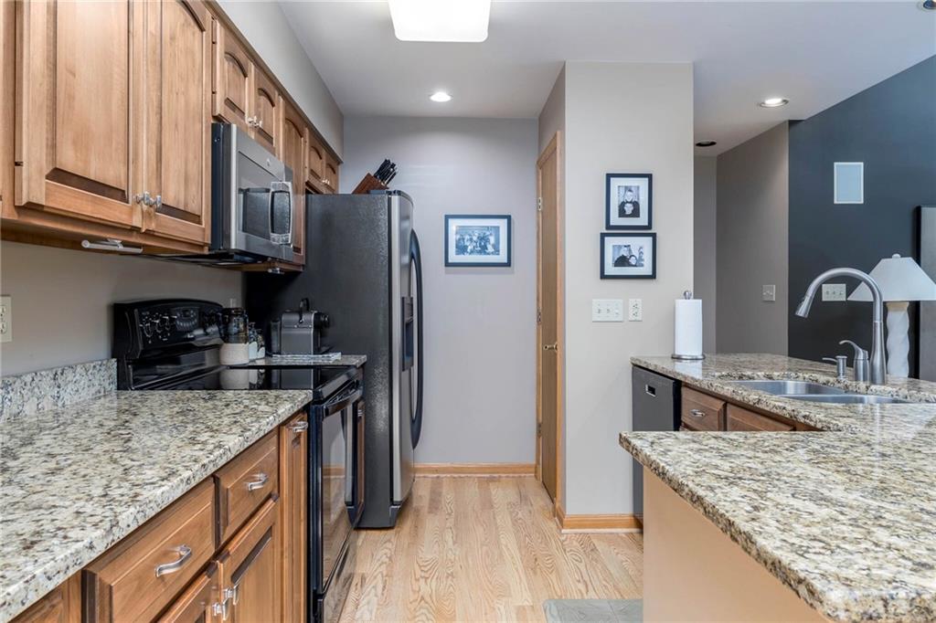 924 Old Washington Road Canonsburg, PA 15317 - Photo 17 of 46 a kitchen with stainless steel appliances granite countertop a sink stove and refrigerator