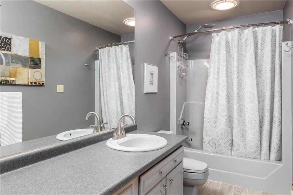 924 Old Washington Road Canonsburg, PA 15317 - Photo 28 of 46 a bathroom with a granite countertop sink toilet and shower