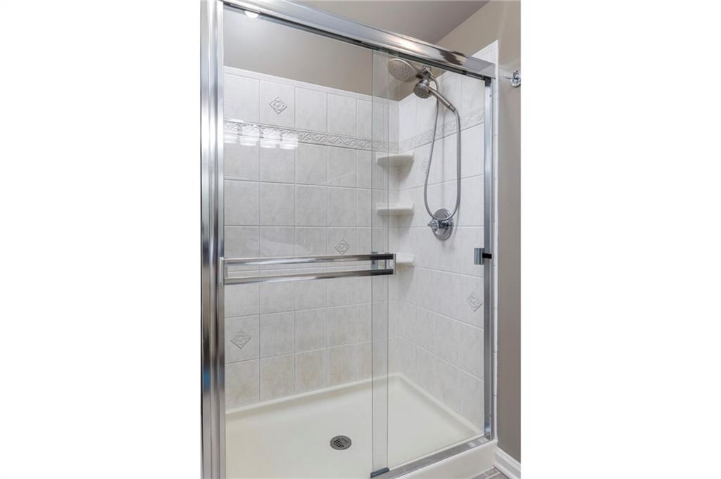 924 Old Washington Road Canonsburg, PA 15317 - Photo 35 of 46 a bathroom with a glass shower door