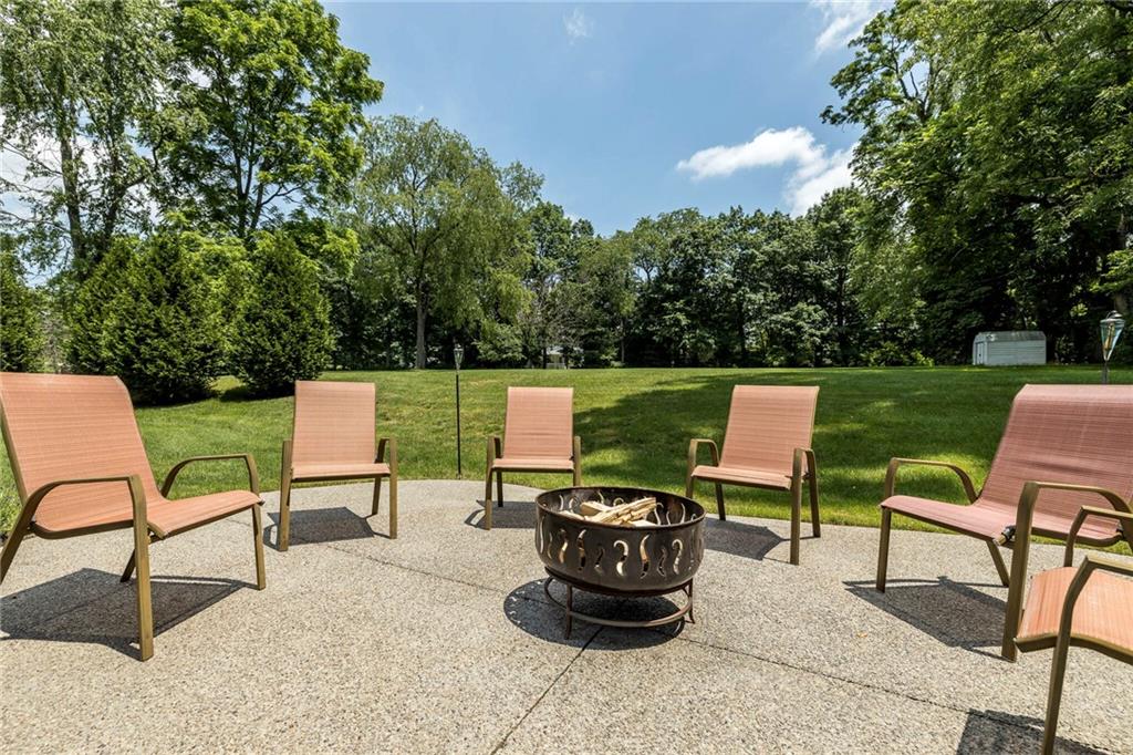 924 Old Washington Road Canonsburg, PA 15317 - Photo 41 of 46 a view of a chairs and table in the back yard