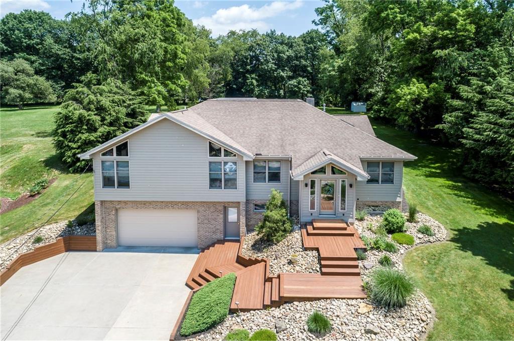 924 Old Washington Road Canonsburg, PA 15317 - Photo 46 of 46 a front view of a house with a yard garage and outdoor seating