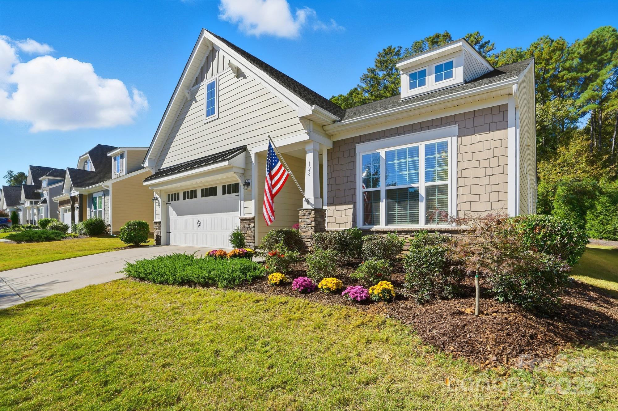 128 Van Gogh Trail Mount Holly, NC 28120 - Photo 2 of 48 a front view of house with yard