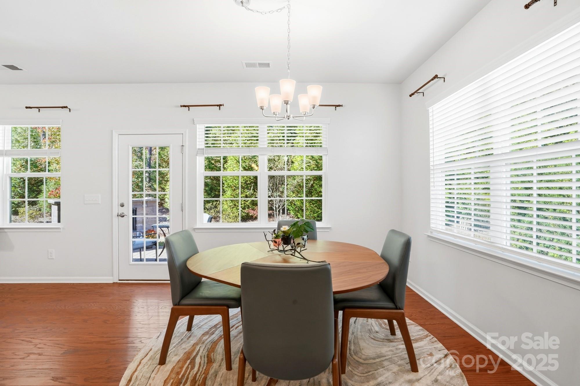 128 Van Gogh Trail Mount Holly, NC 28120 - Photo 22 of 48 a view of a dining room with furniture window and outside view