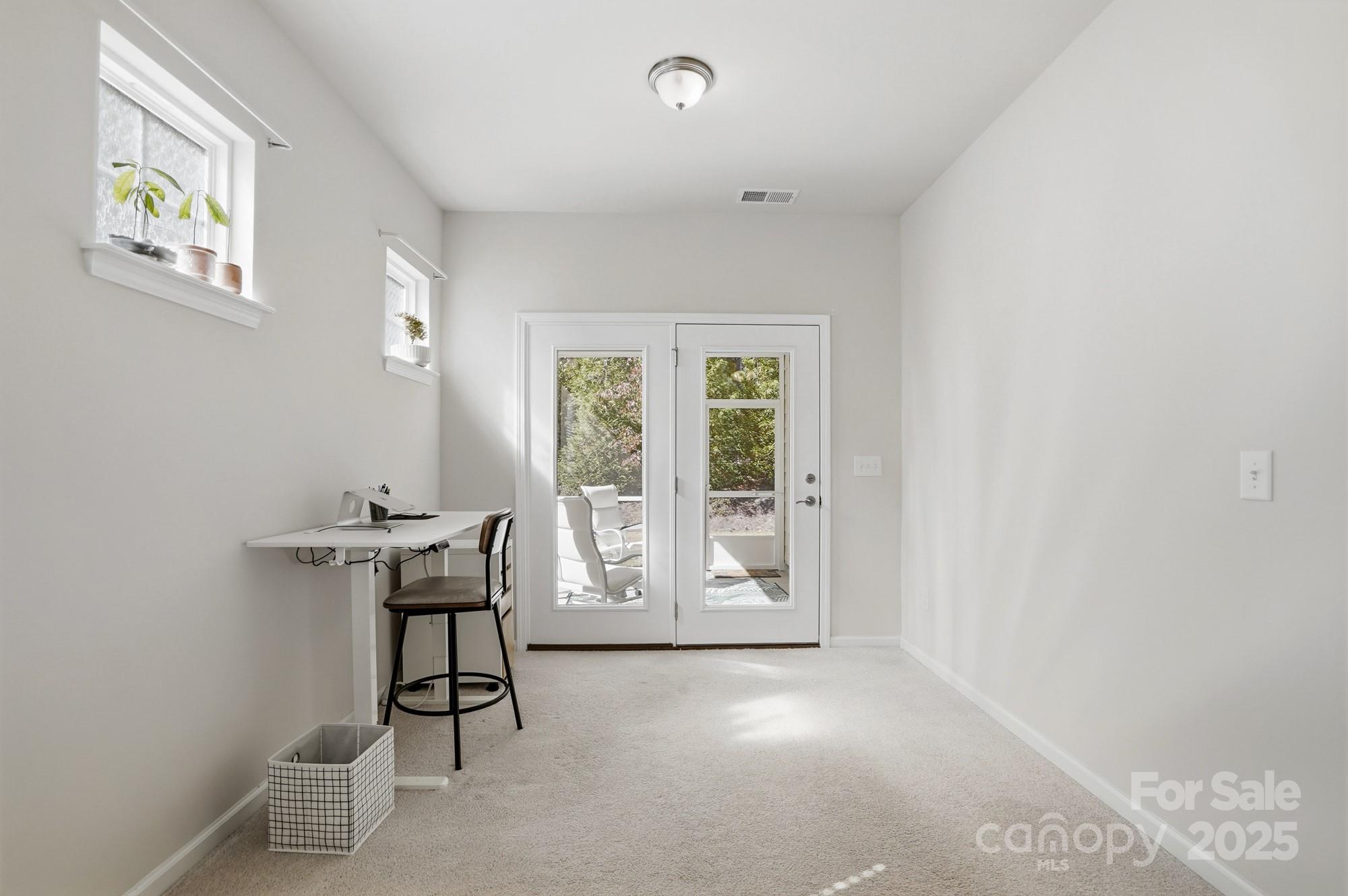 128 Van Gogh Trail Mount Holly, NC 28120 - Photo 25 of 48 a view of an empty room with a window