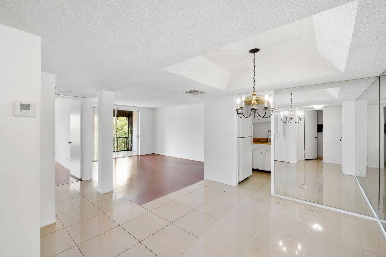 3720 Inverrary Drive, Unit 3D Lauderhill, FL 33319 - Photo 2 of 25 a view of a livingroom with a chandelier