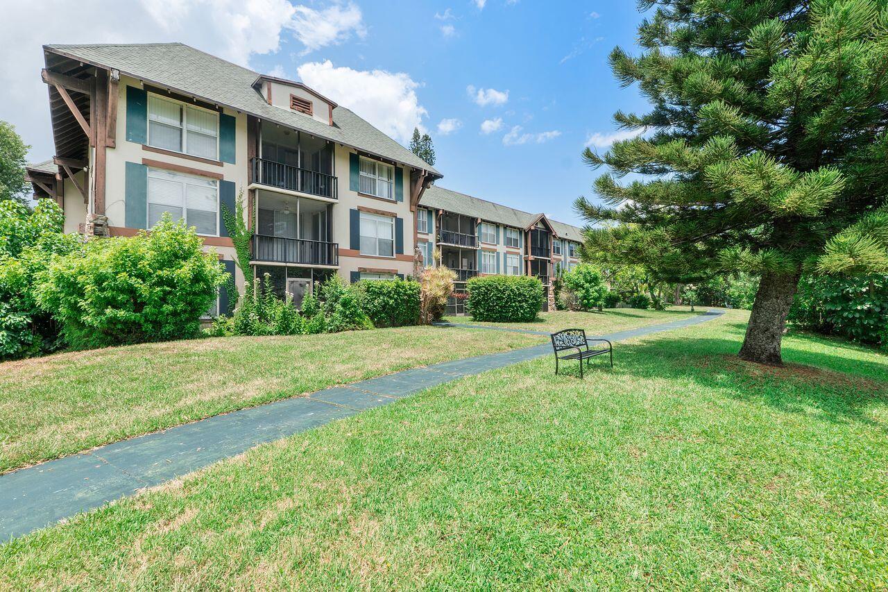 3720 Inverrary Drive, Unit 3D Lauderhill, FL 33319 - Photo 21 of 25 a house view with swimming pool and garden