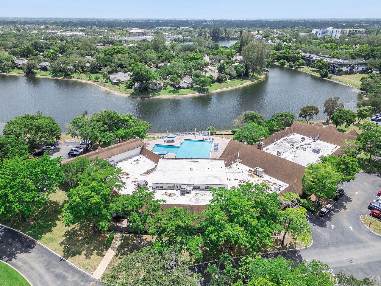 3720 Inverrary Drive, Unit 3D Lauderhill, FL 33319 - Photo 23 of 25 an aerial view of a house with a lake view