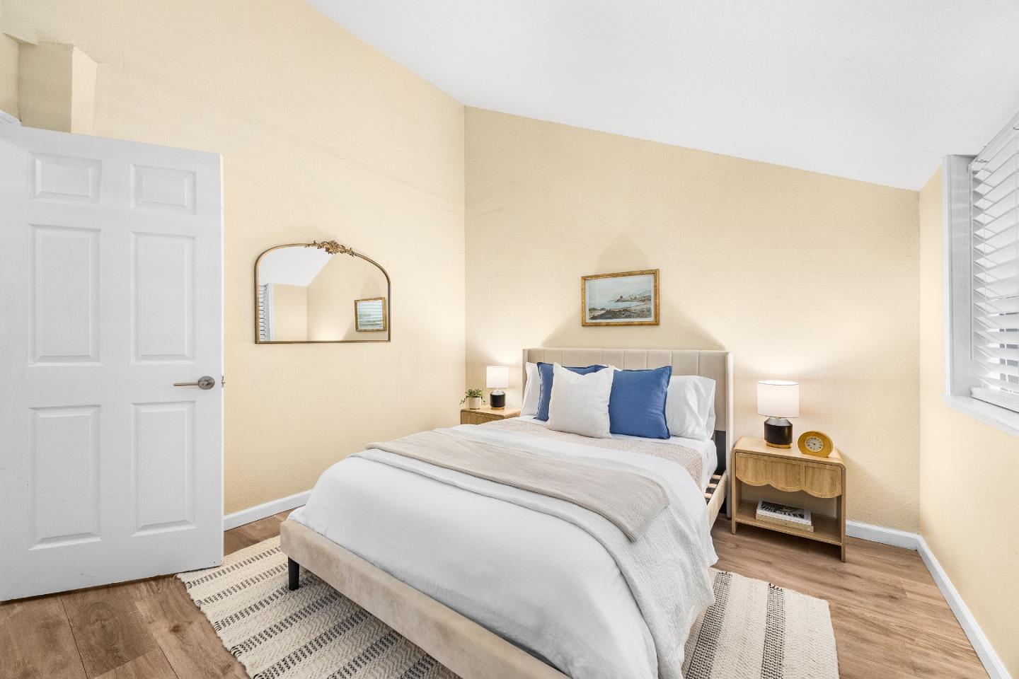 1644 Ocean Street Santa Cruz, CA 95060 - Photo 30 of 60 a bedroom with a bed and a night stand