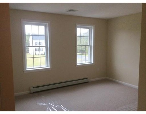 Lot 28-136 Forbes Road Rochester, MA 02770 - Photo 11 of 18 an empty room with a window