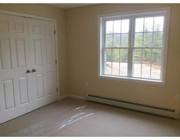 Lot 28-136 Forbes Road Rochester, MA 02770 - Photo 12 of 18 an empty room with a window