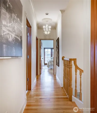 a bathroom with a toilet a sink and a mirror
