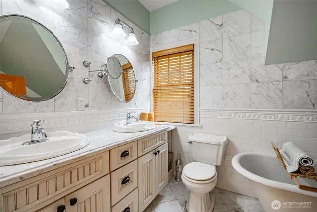 a bathroom with a shower and a sink
