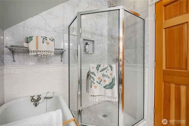 a view of a hallway with washer and dryer