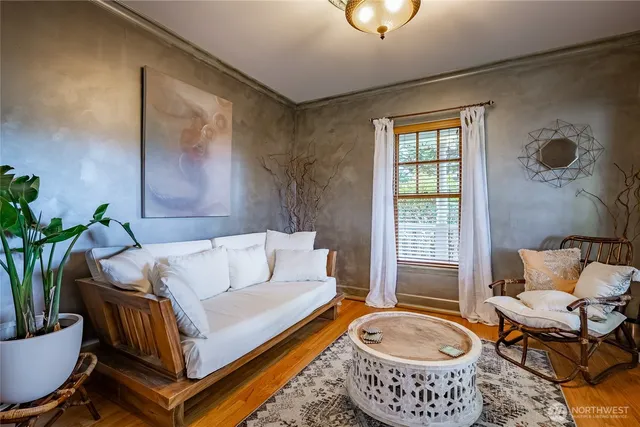 a living room with a couch and a table