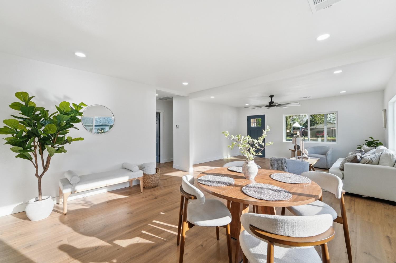 430 Laurel Avenue Modesto, CA 95351 - Photo 16 of 28 a view of a dining room with furniture and wooden floor