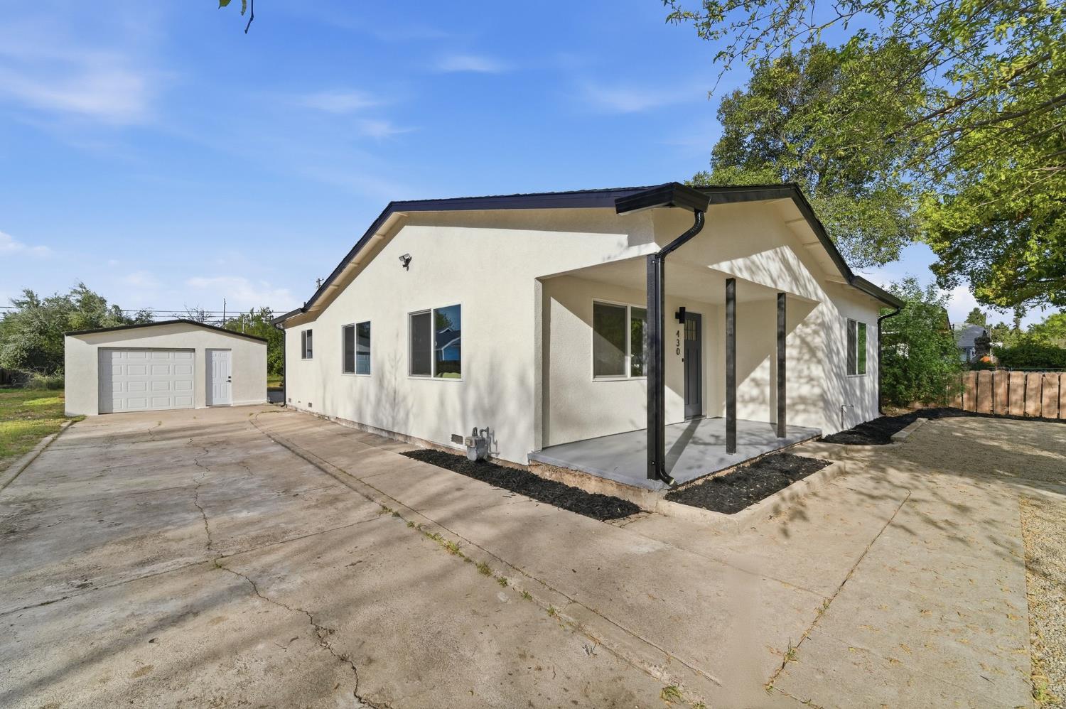 430 Laurel Avenue Modesto, CA 95351 - Photo 2 of 28 a view of a house with backyard
