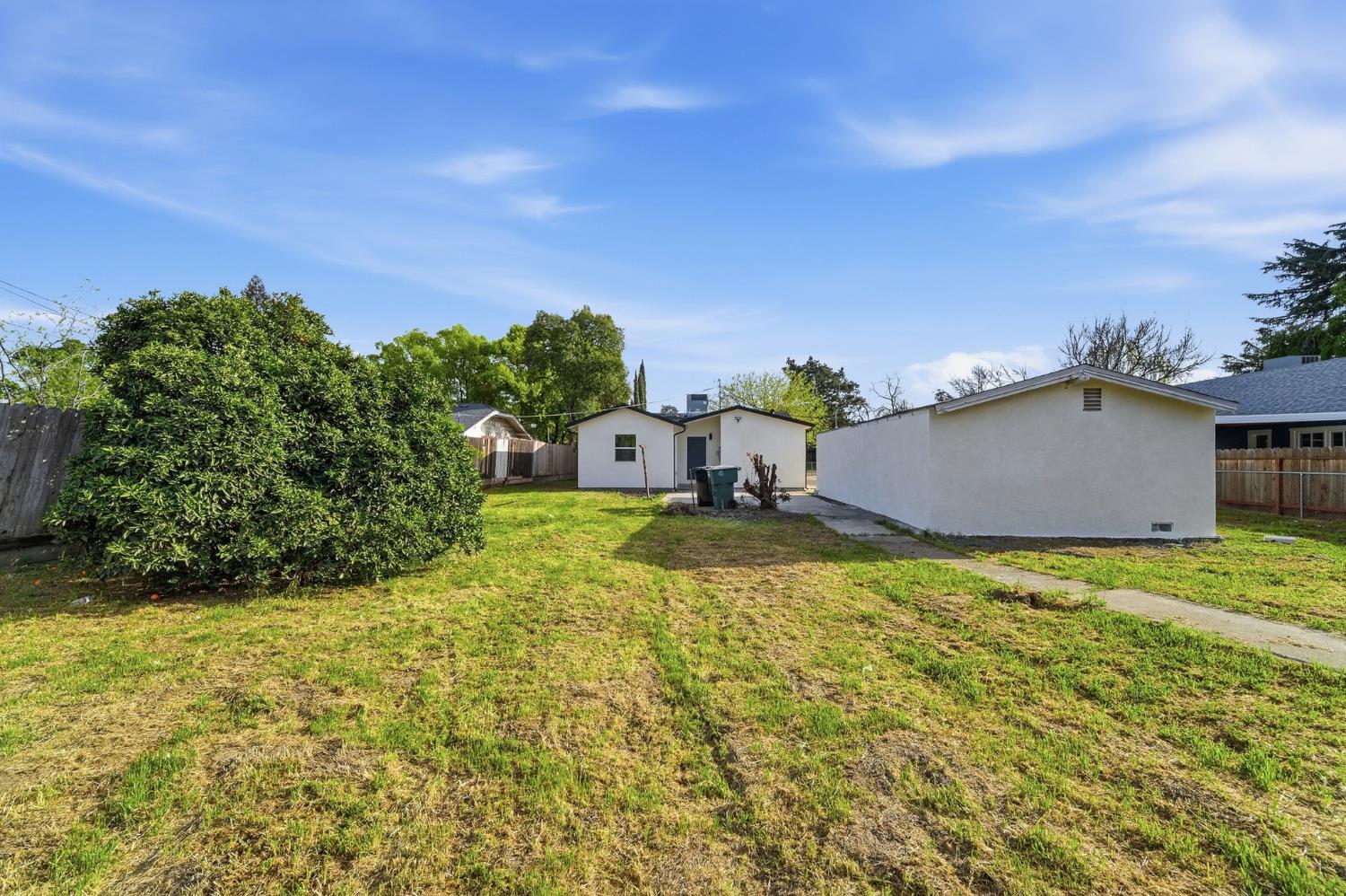 430 Laurel Avenue Modesto, CA 95351 - Photo 26 of 28 a house view with swimming pool in front of it