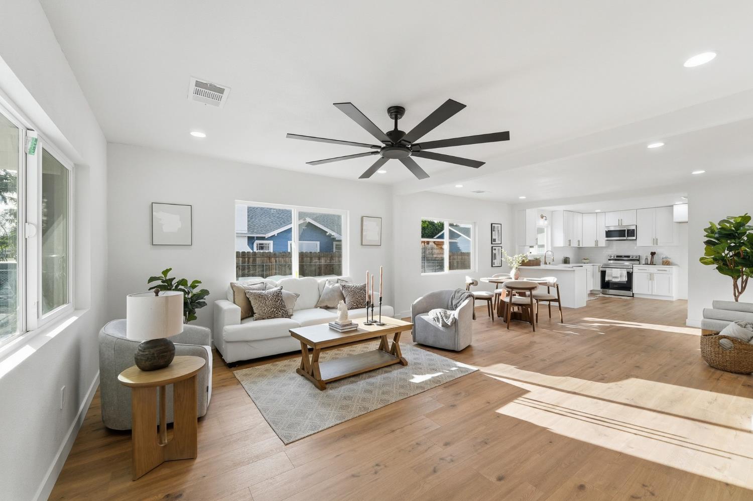430 Laurel Avenue Modesto, CA 95351 - Photo 3 of 28 a living room with furniture or couches and a large window