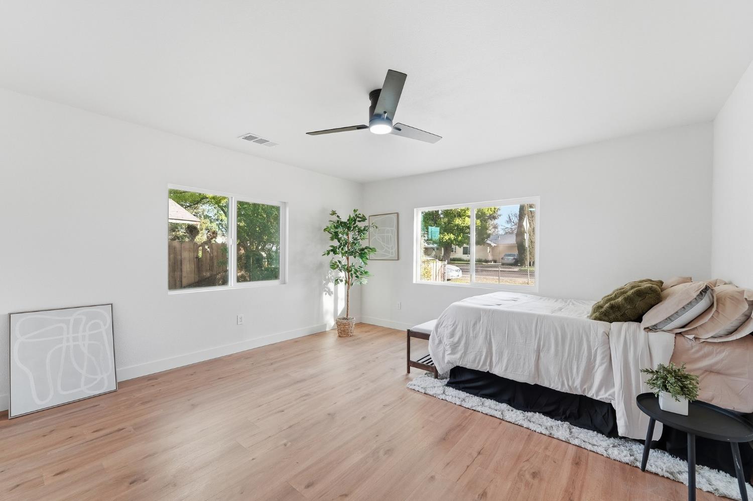 430 Laurel Avenue Modesto, CA 95351 - Photo 10 of 28 a bedroom with a bed and a window