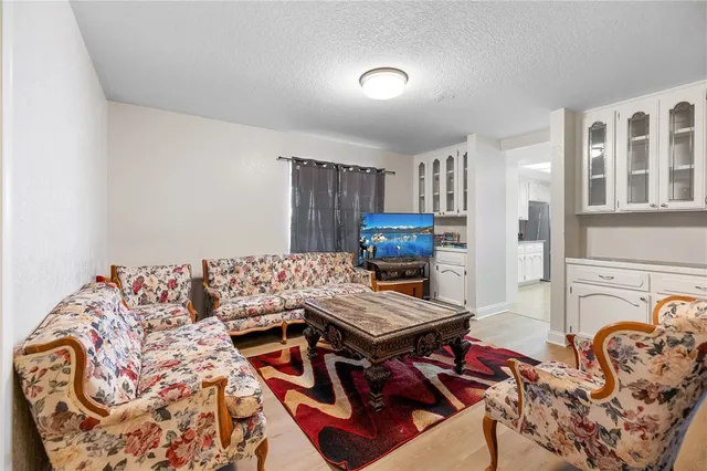 a bedroom with furniture and a couch