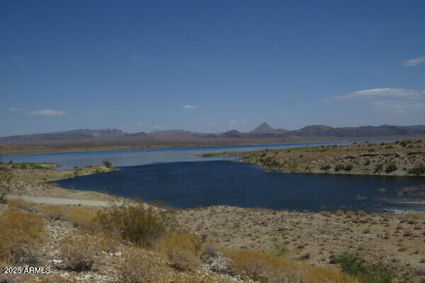 1111 West Pipeline Ranch Road Congress, AZ 85332 - Photo 24 of 48 a view of a lake with sunset in background