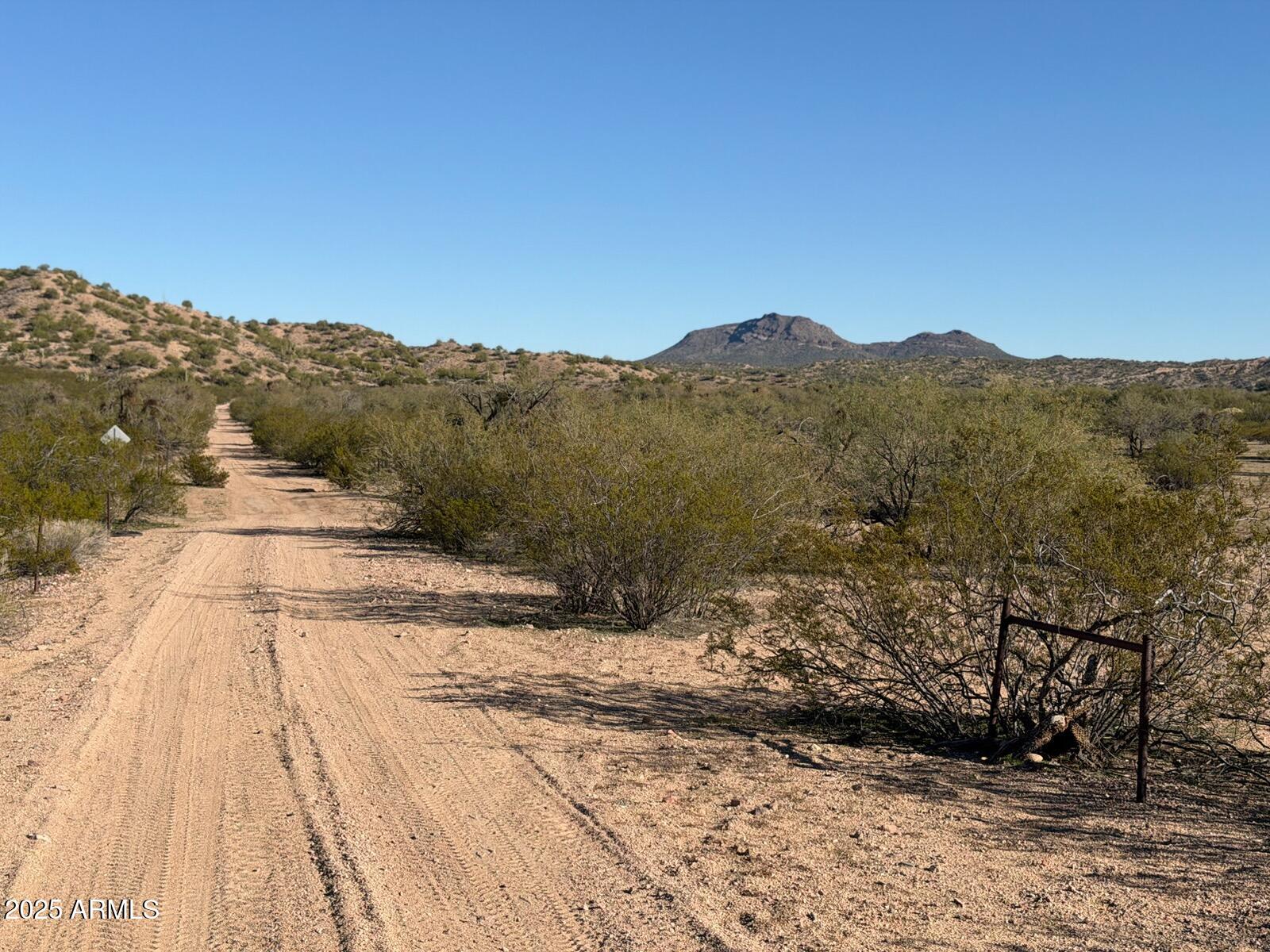 1111 West Pipeline Ranch Road Congress, AZ 85332 - Photo 30 of 48 a view of a backyard with wooden fence