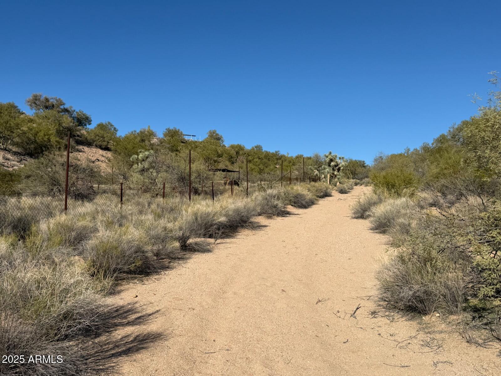1111 West Pipeline Ranch Road Congress, AZ 85332 - Photo 32 of 48 a view of a dry yard with mountains in the background