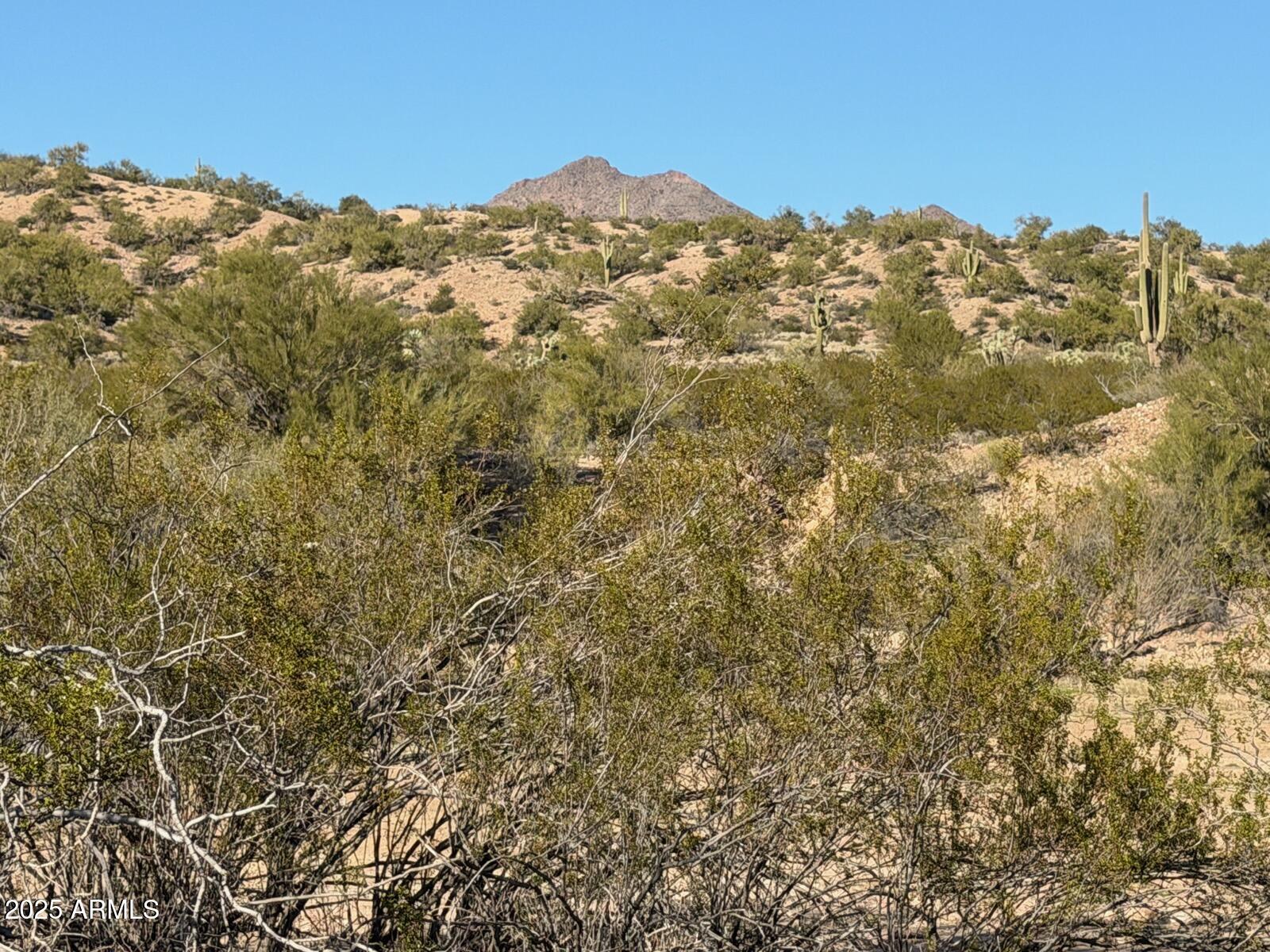 1111 West Pipeline Ranch Road Congress, AZ 85332 - Photo 36 of 48 a view of a large building with mountains in the background