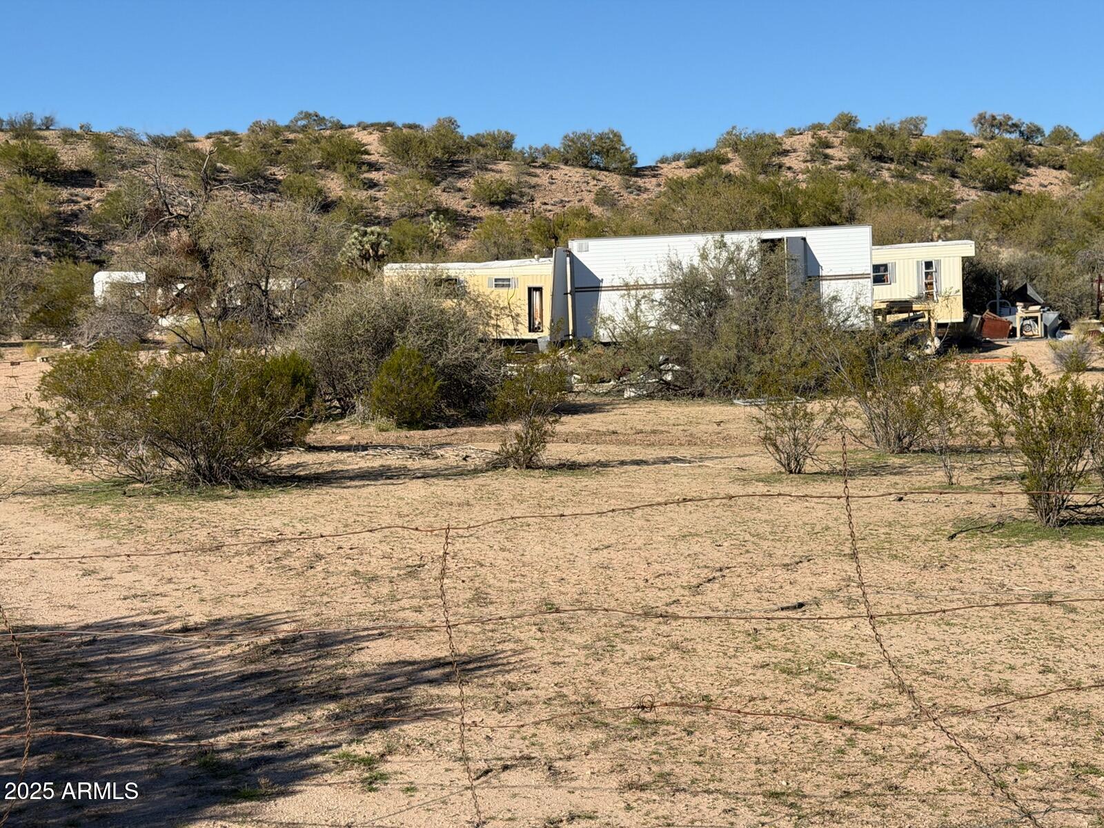 1111 West Pipeline Ranch Road Congress, AZ 85332 - Photo 10 of 48 a view of a house with a yard