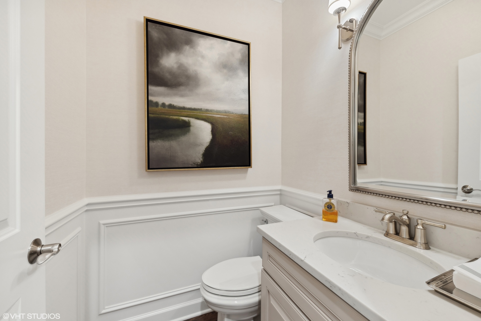 2513 Geranium Way Rolling Meadows, IL 60008 - Photo 17 of 19 a bathroom with a toilet sink and mirror