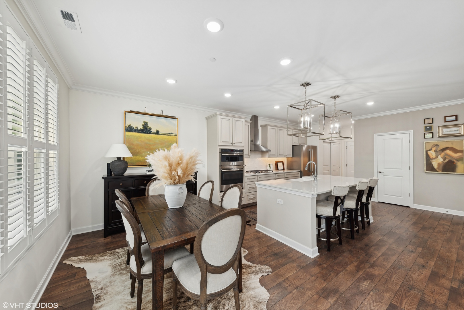 2513 Geranium Way Rolling Meadows, IL 60008 - Photo 8 of 19 a view of a dining room with furniture and wooden floor