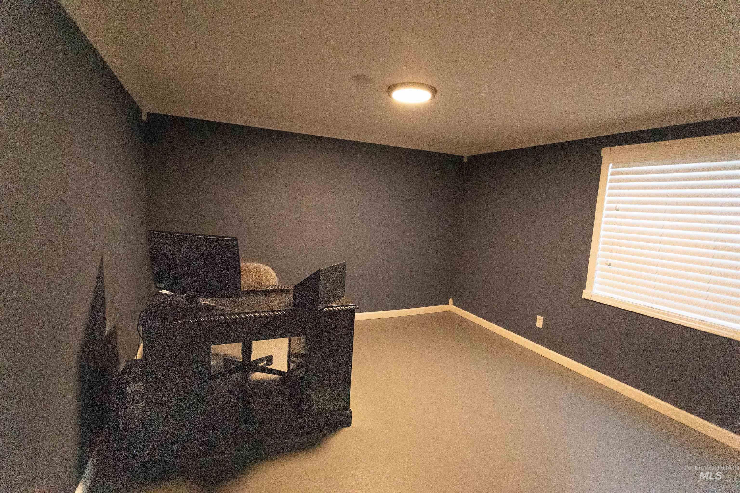 1400 Anderson Corner Road Parma, ID 83660 - Photo 11 of 31 Office space featuring carpet flooring and baseboards