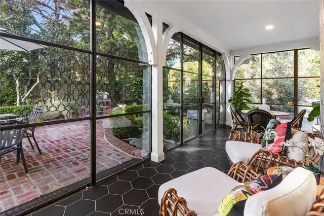 a outdoor living space with furniture and garden view