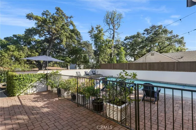 a view of a balcony with plants