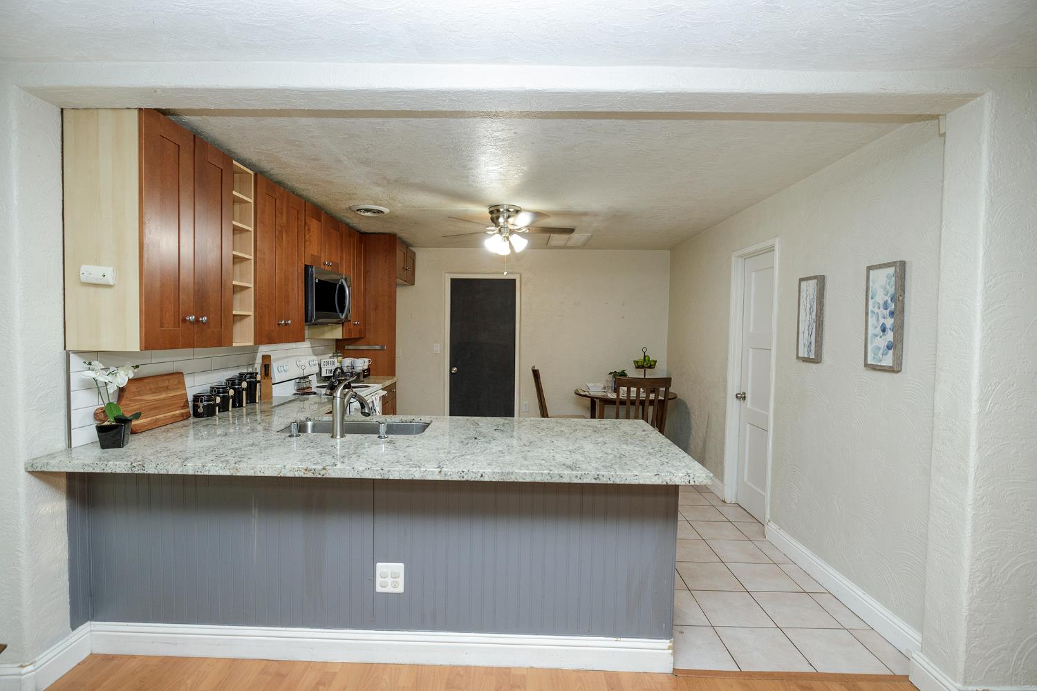 1244 Melrose Avenue Modesto, CA 95350 - Photo 11 of 39 a bathroom with a sink and a mirror