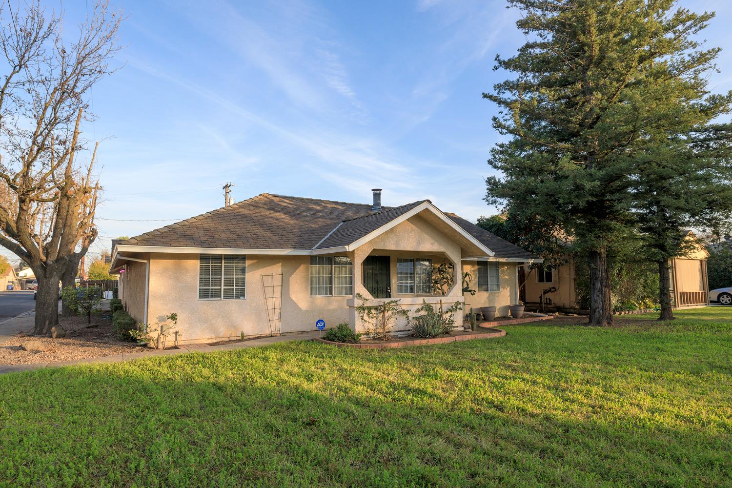 1244 Melrose Avenue Modesto, CA 95350 - Photo 2 of 39 a front view of house with yard and green space