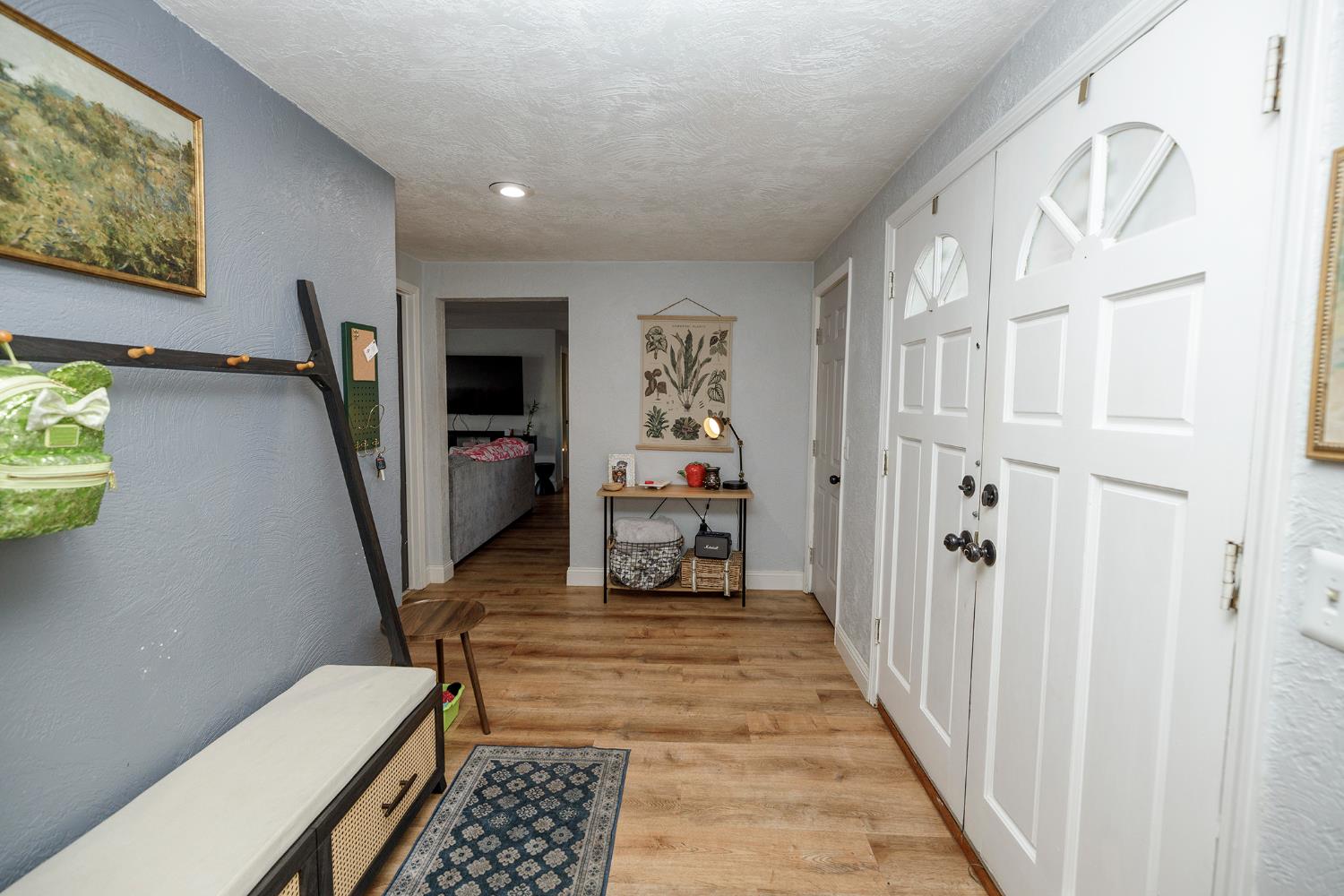 1244 Melrose Avenue Modesto, CA 95350 - Photo 27 of 39 a view of a hallway with workspace